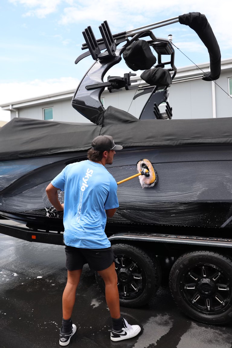 Skylo technician detailing a vehicle on-site