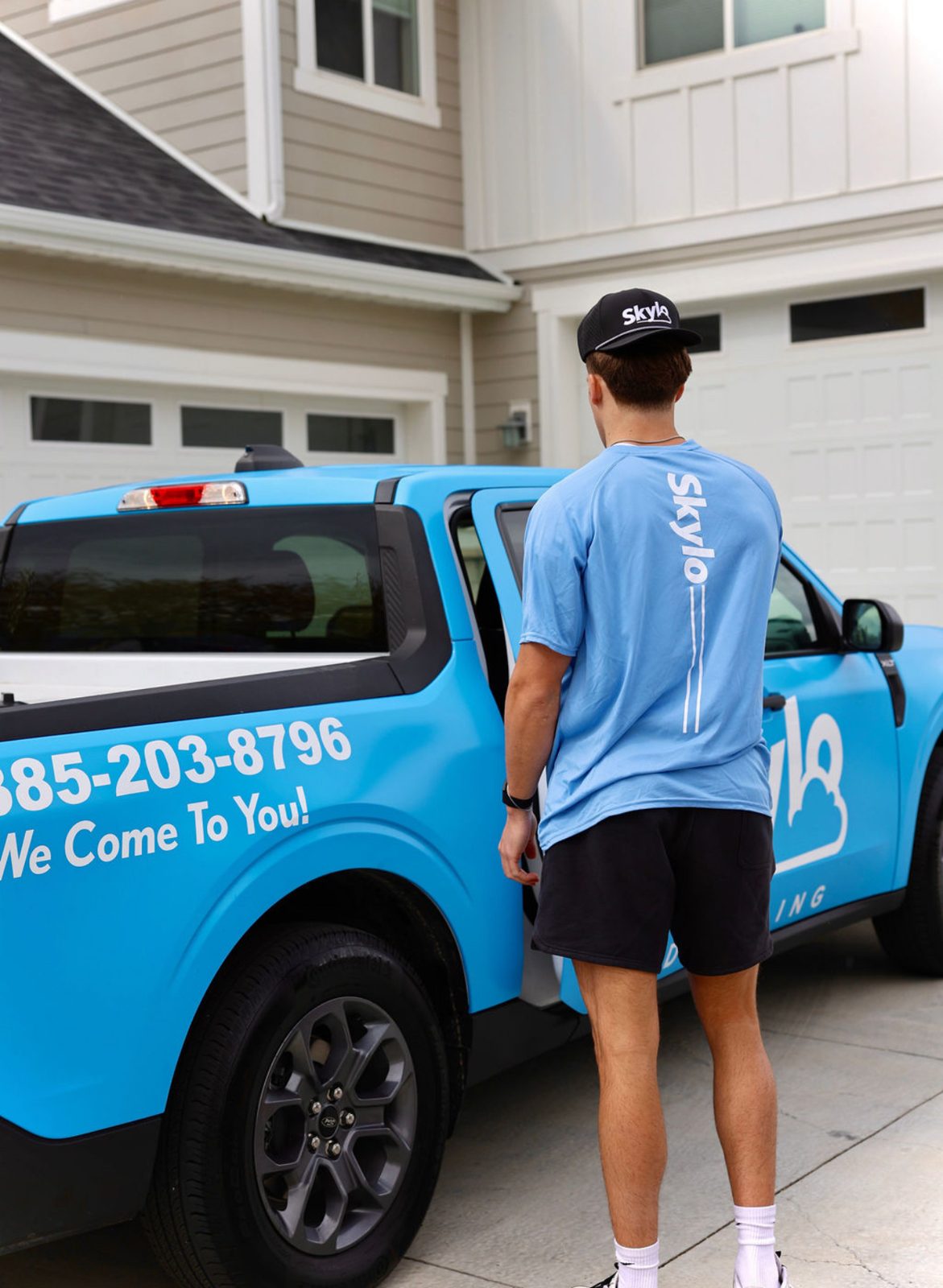 Skylo Detailing truck arriving at a home in Orem